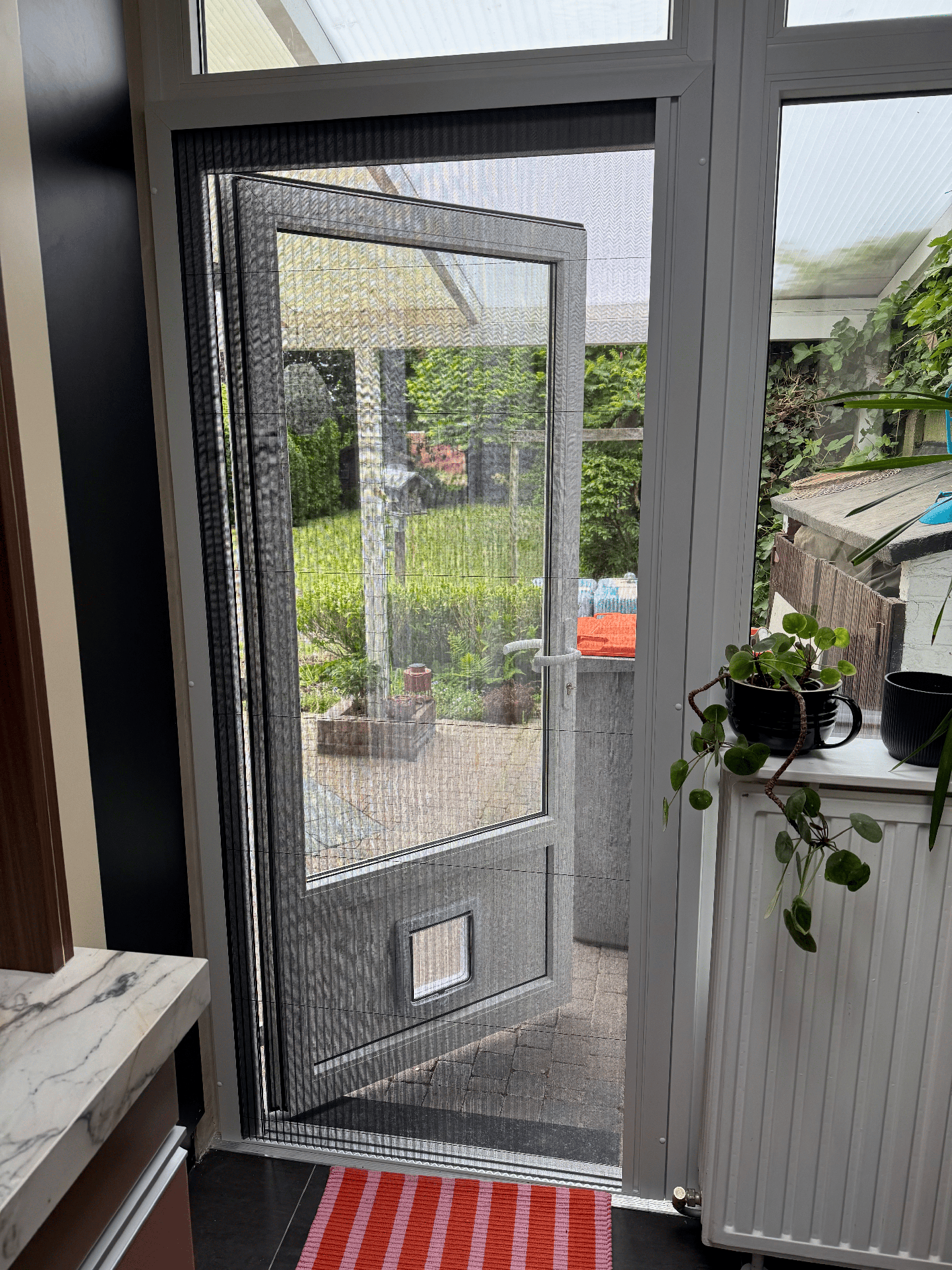PVC achterdeur met kattenluik